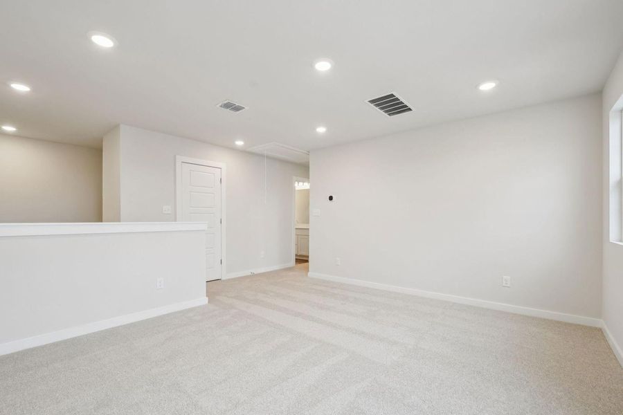 Spacious, unfurnished interior of a new home in The Glen at Stallion Run, Buda (Image 20).