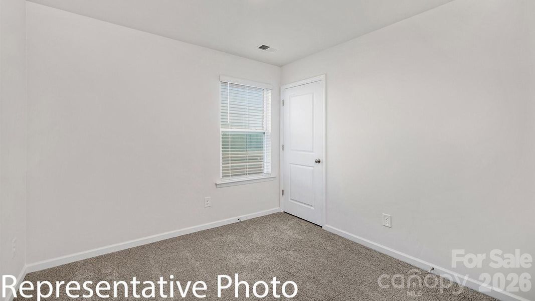 Spacious, unfurnished interior of a new home in Fergus Crossing, York (Image 20).