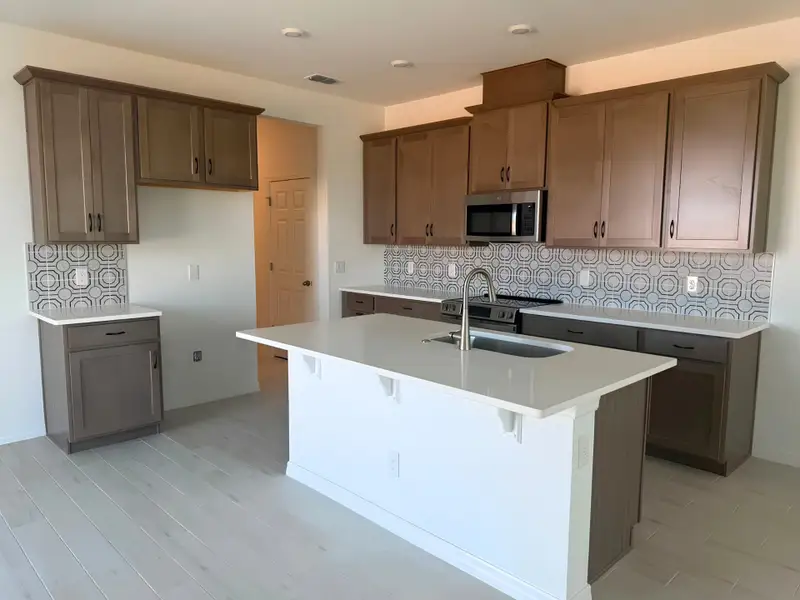 Furnished interior view inside a new home in Cypress Bluff, Groveland (Image 3).