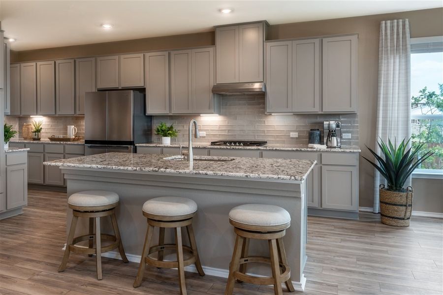 Representative furnished interior of a home built from the 3471 by KB Home in Salerno - Hallmark Collection, Round Rock (Image 7).