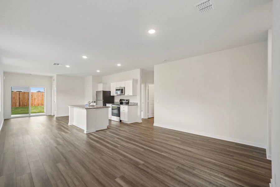 Representative unfurnished interior of a home built from the Odyssey by Starlight Homes in Oakfield Lakes, Parrish (Image 14).