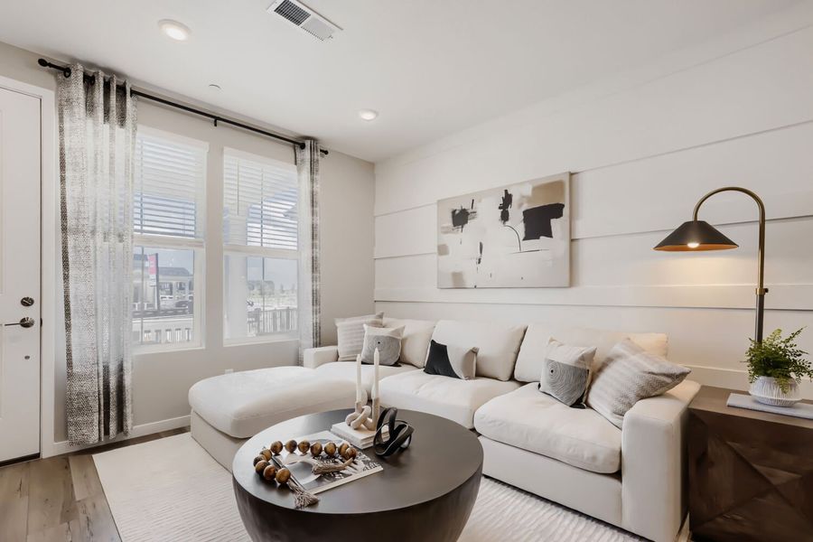 Representative furnished interior of a home built from the Novella One by Brookfield Residential in Barefoot, Firestone (Image 5).