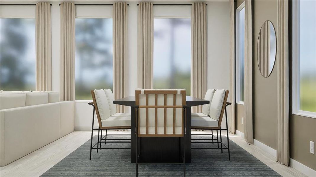 Dining space featuring light wood-style flooring