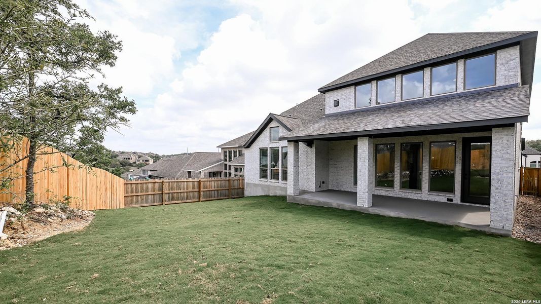 Exterior details and patio area of a home in Johnson Ranch, Bulverde (Image 3).