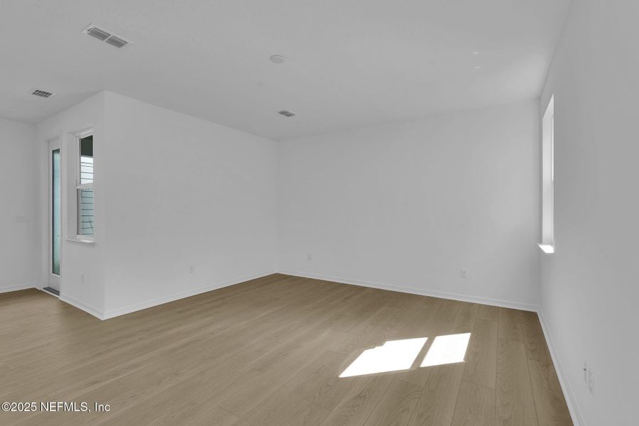 Spacious, unfurnished interior of a new home in Hawthorn Park at Wildlight, Yulee (Image 22).