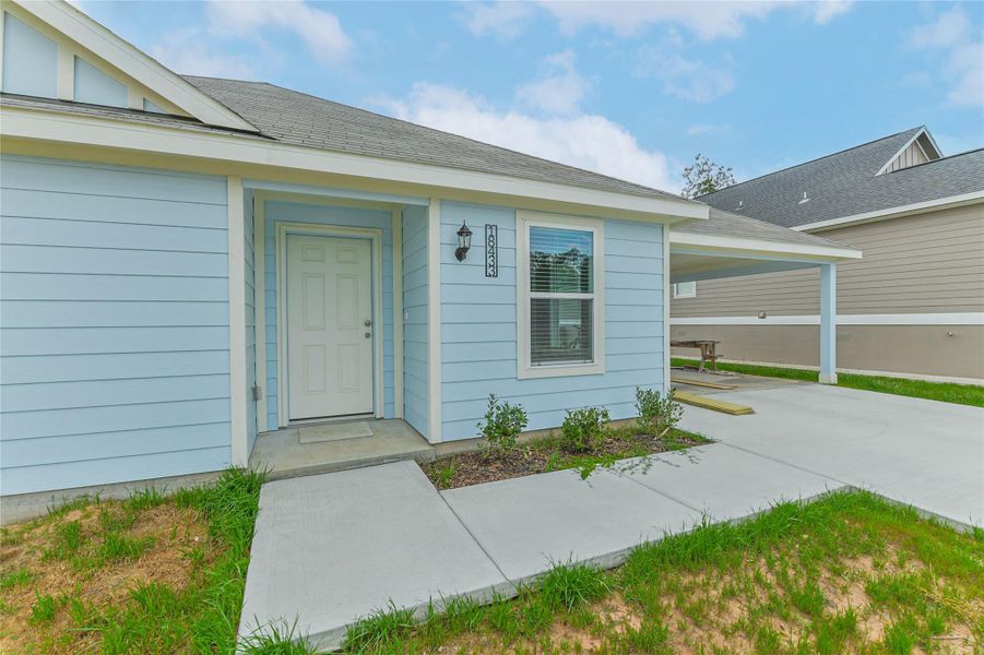 Exterior details and patio area of a home in , Conroe (Image 18).