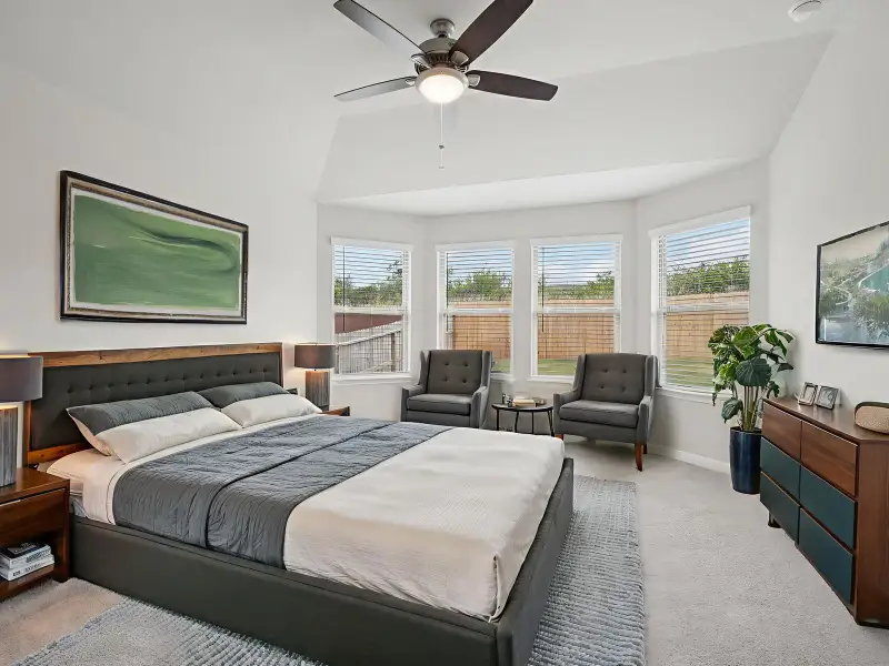 Virtually staged primary suite in the Briscoe floorplan at a Meritage Homes community. Virtually staged primary suite in the Briscoe floorplan at a Meritage Homes community.