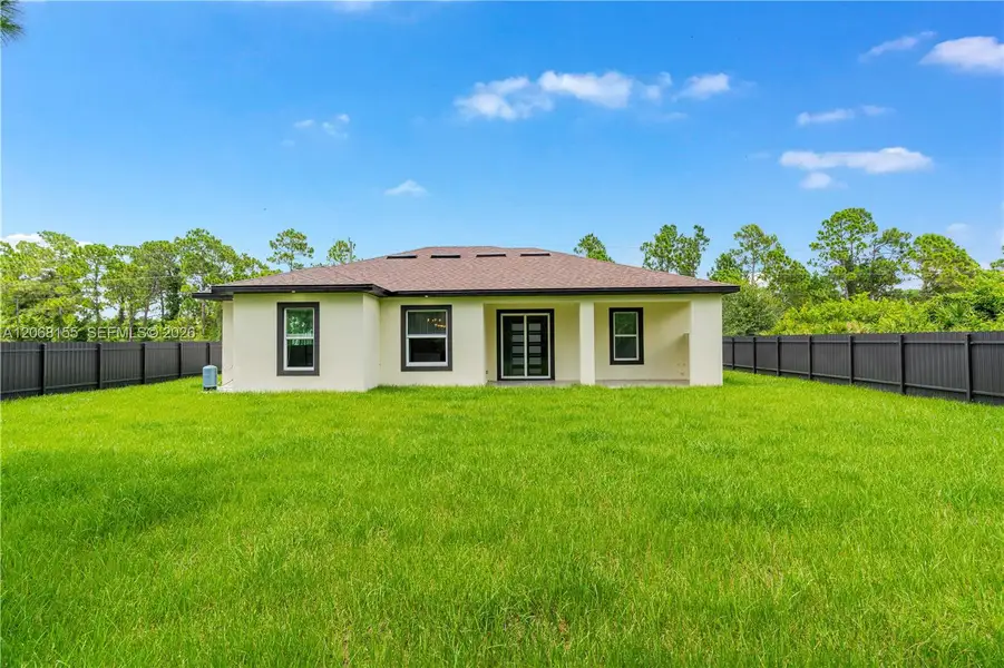Exterior details and patio area of a home in , Lehigh Acres (Image 28). Exterior details and patio area of a home in , Lehigh Acres (Image 28).