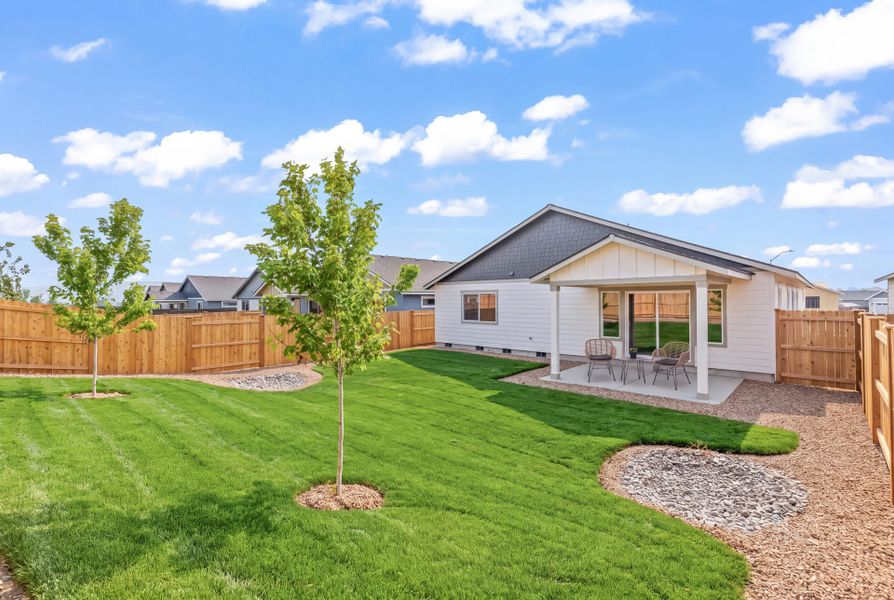 Exterior details and patio area of a home in IronHorse, Prineville (Image 25).
