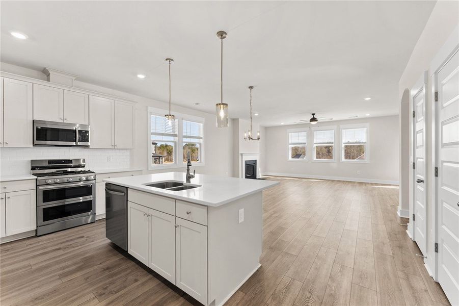 This bright and open-concept layout features a gou