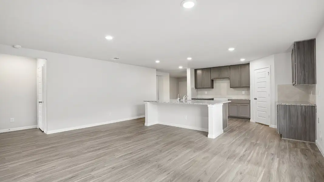 Furnished interior view inside a new home in Hunters Ranch, San Antonio (Image 7).