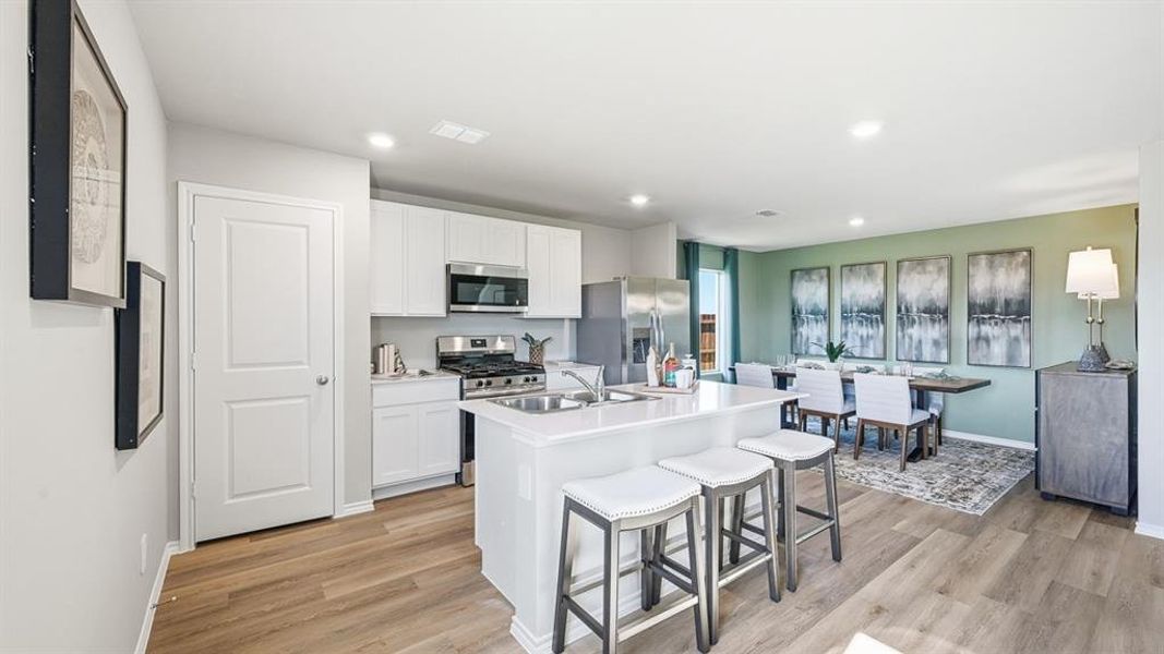 Kitchen-All Home and community information, including pricing, included features, terms, availability and amenities, are subject to change at any time without notice or obligation. All Drawings, pictures, photographs, video, square footages, floor plans, elevations, features, colors and sizes are approximate for illustration purposes only and will vary from the homes as built.