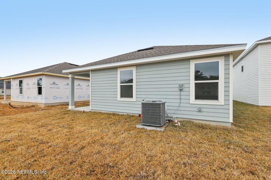 Exterior details and patio area of a home in Kings Landing, Jacksonville (Image 4).