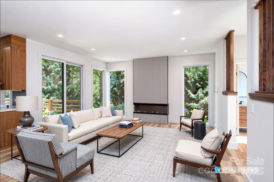 Bright Living Room with Floor-to-Ceiling Tiled Electric Fireplace Bright Living Room with Floor-to-Ceiling Tiled Electric Fireplace