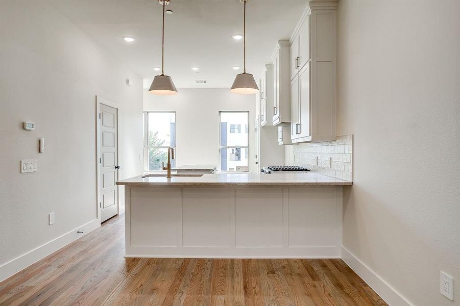 Modern townhome living room perfect for relaxing or entertaining guests. Modern townhome living room perfect for relaxing or entertaining guests.