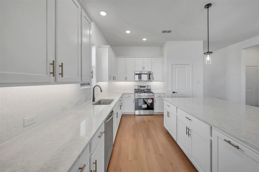 Furnished interior view inside a new home in Beacon Point at Lago Mar 50’ Homesites, Texas City (Image 9).