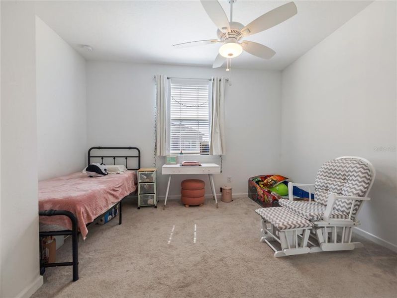 Bedroom 2 with closet and linen closet across hall