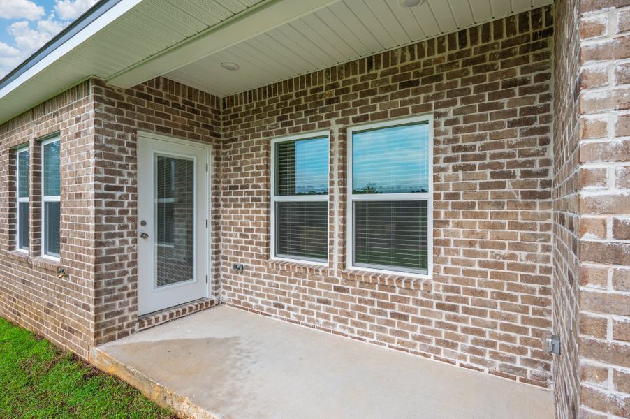 Exterior details and patio area of a home in Blossom Grove, Crestview (Image 17).