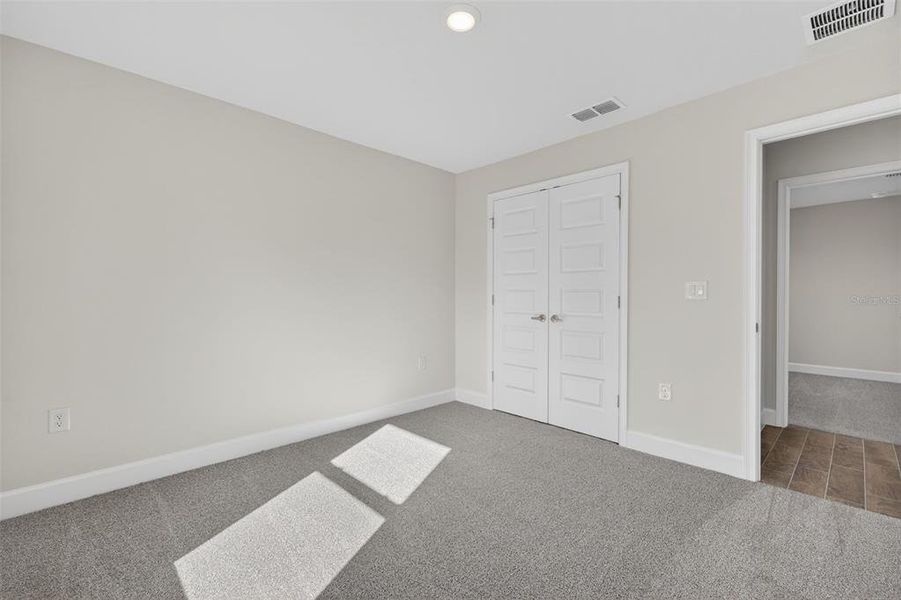 Spacious, unfurnished interior of a new home in Hill Country Estates, Dade City (Image 48).