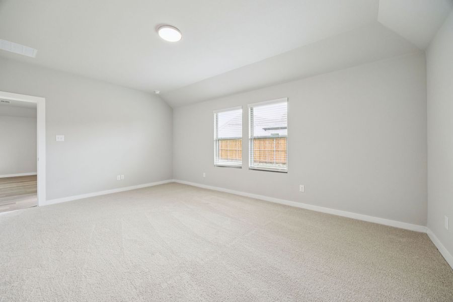 Primary Suite in the Hayden home plan by Trophy Signature Homes – REPRESENTATIVE PHOTO