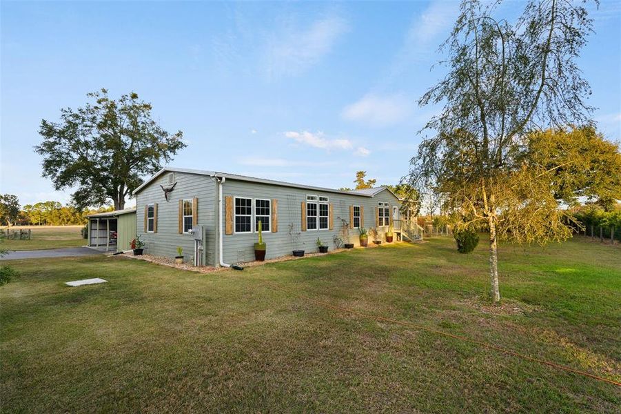 Exterior details and patio area of a home in , Alachua (Image 2). Exterior details and patio area of a home in , Alachua (Image 2).
