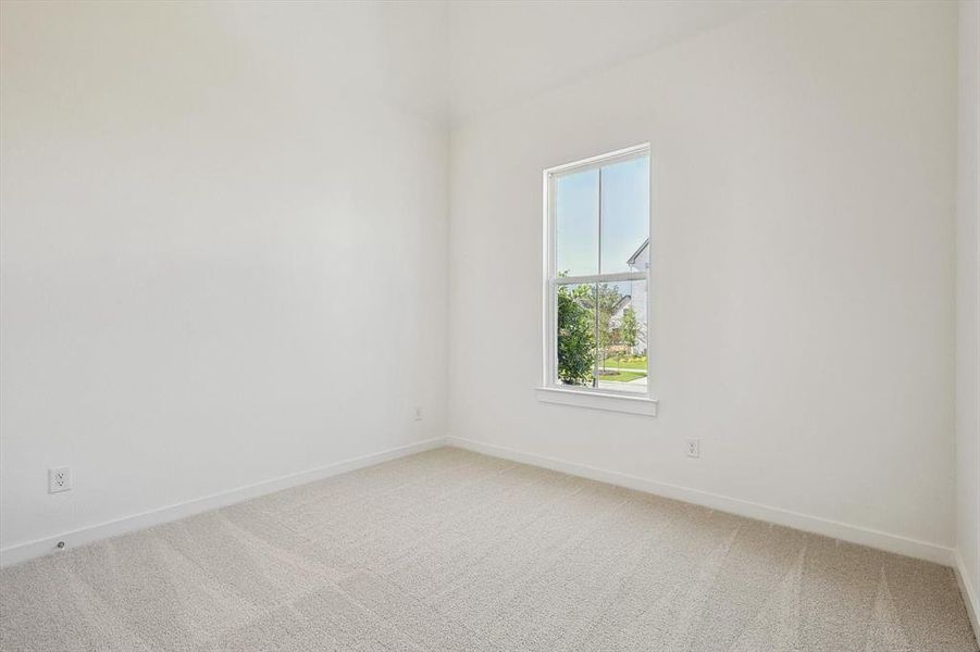 Unfurnished room with carpet floors