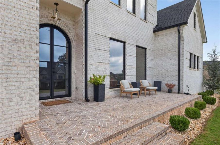 Exterior details and patio area of a home in , Hoschton (Image 32).