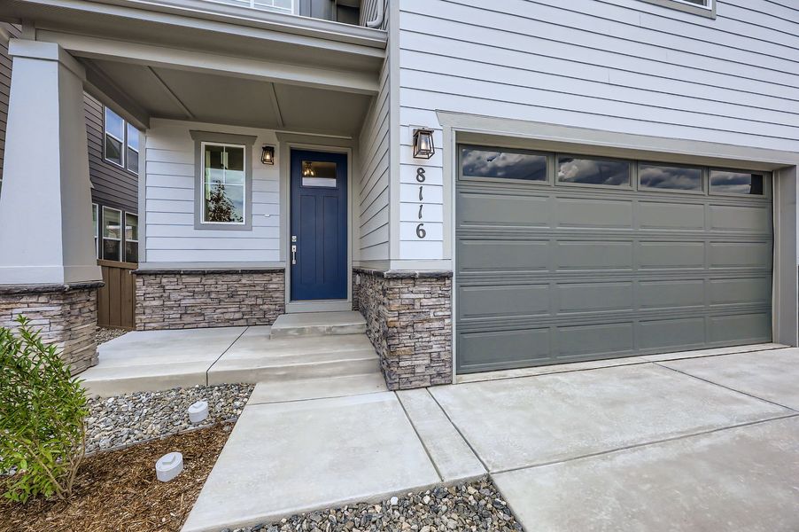 Front exterior of a new home in Sterling Ranch 40s, Colorado Springs, CO, highlighting curb appeal (Image 18).