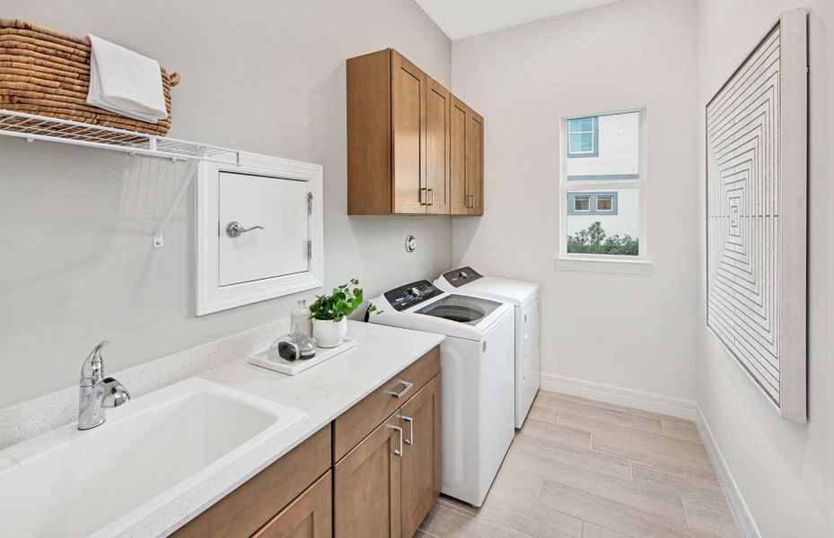 Representative furnished interior of a home built from the Prestige by DiVosta in Emerson Oaks, Vero Beach (Image 11).