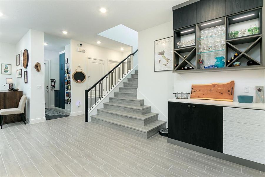 kitchen opens to wine rack