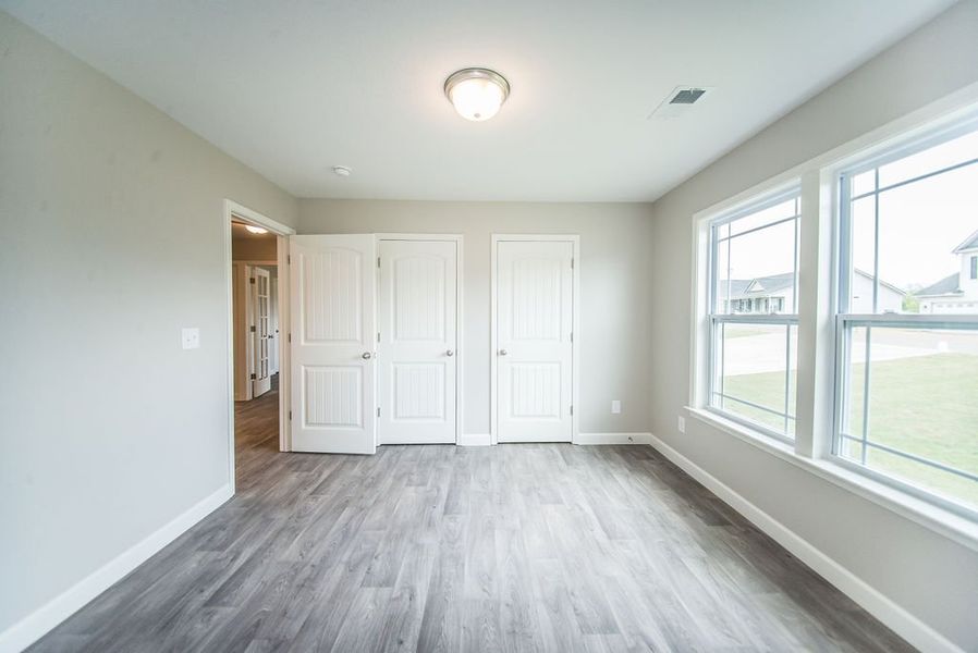 Representative unfurnished interior of a home built from the Beaumont by Enchanted Homes in Guadalupe Heights, Seguin (Image 31).