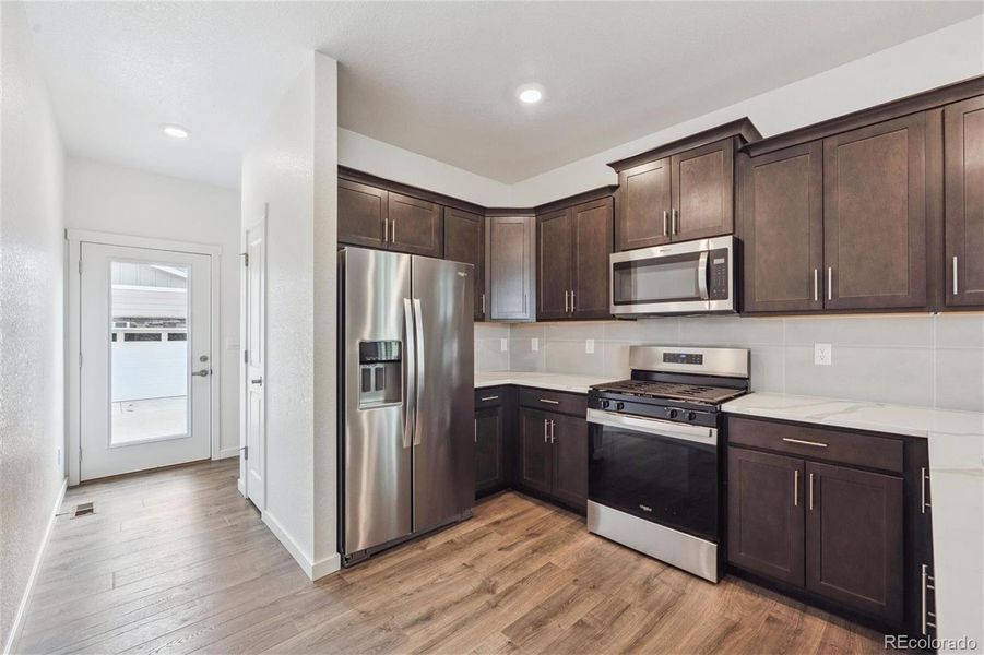 Furnished interior view inside a new home in Horizon Uptown, Aurora (Image 7).