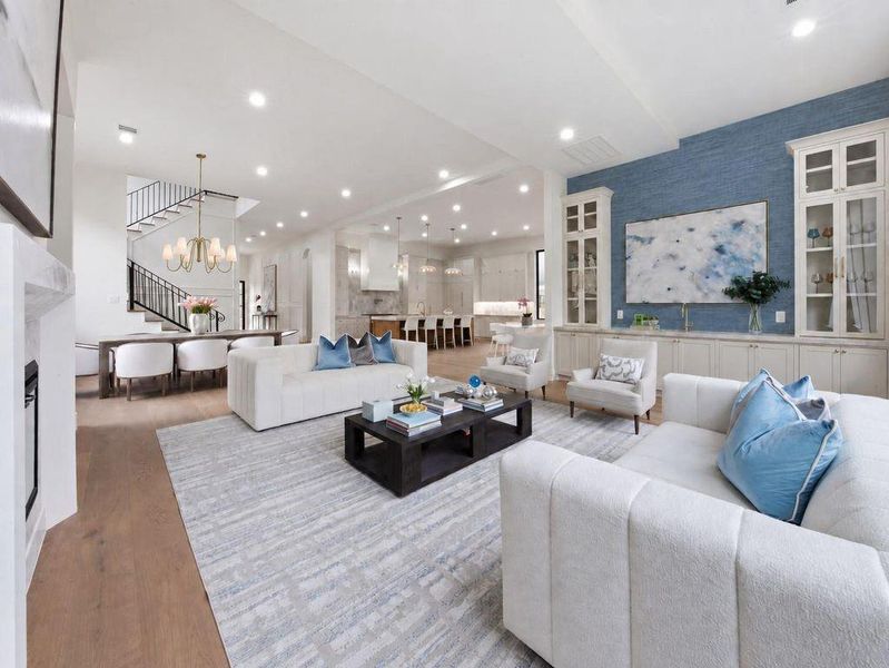 Living room with views into the breakfast room, dinning room and living room and Wet bar. Perfect for entertaining and family lifestyle