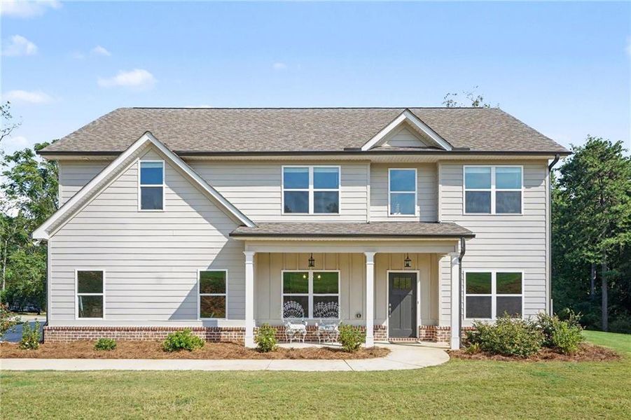 Front exterior of a new home in , Covington, GA, highlighting curb appeal (Image 1). Front exterior of a new home in , Covington, GA, highlighting curb appeal (Image 1).