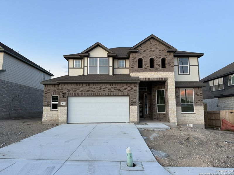 Front exterior of a new home in Buffalo Crossing – New Phase Now Preselling, Cibolo, TX, highlighting curb appeal (Image 20).