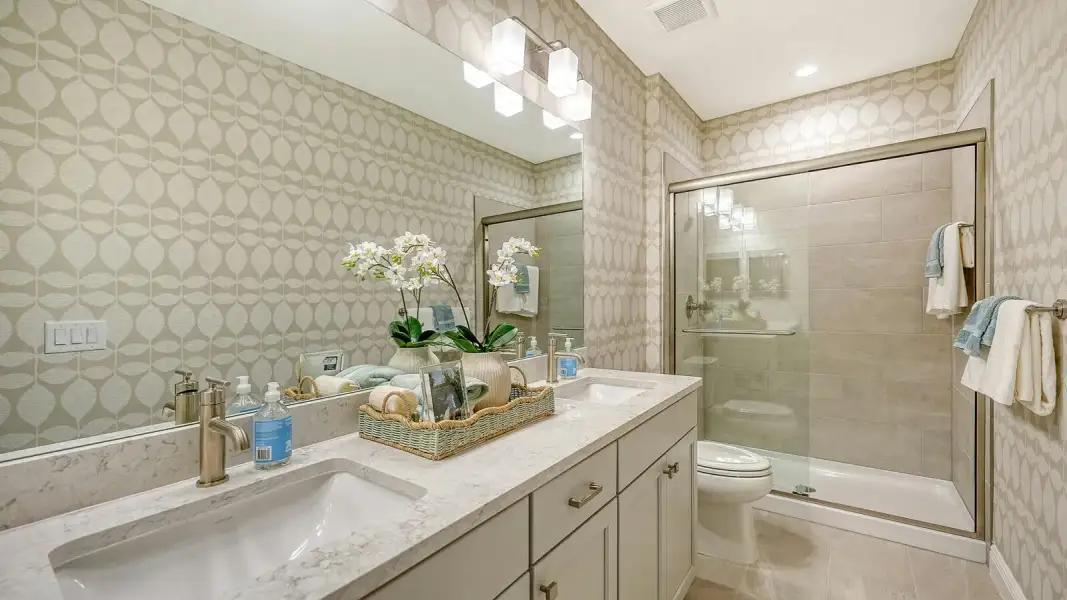 Furnished interior view inside a new home in SkySail Real Estate and Homes for Sale in Naples, FL - Neal Communities, Naples (Image 27).
