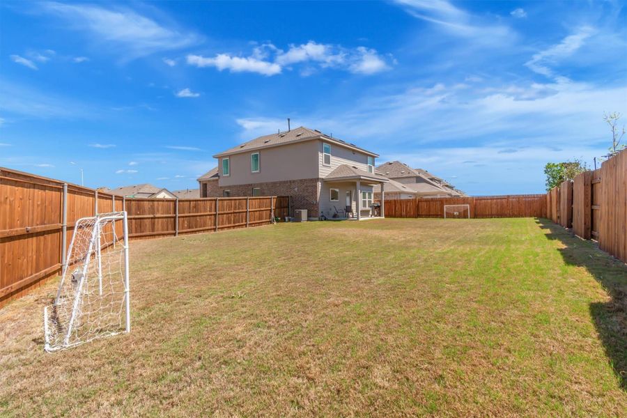 Exterior details and patio area of a home in Crosswinds, Kyle (Image 3).