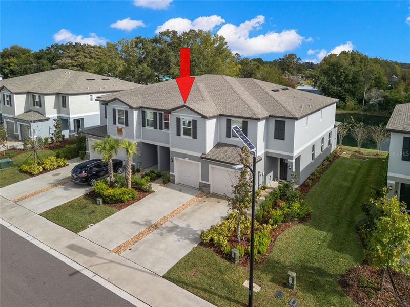 Front exterior of a new home in , Land O' Lakes, FL, highlighting curb appeal (Image 26). Front exterior of a new home in , Land O' Lakes, FL, highlighting curb appeal (Image 26).