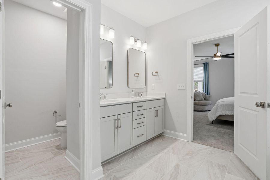 Furnished interior view inside a new home in Tidewater at Lakes of Cane Bay, Summerville (Image 17).