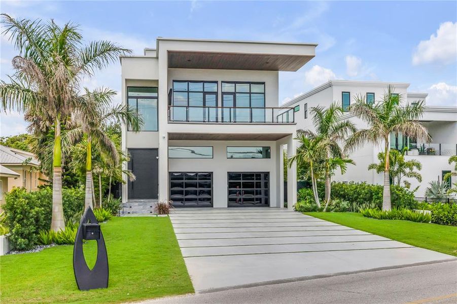 Front exterior of a new home in , New Smyrna Beach, FL, highlighting curb appeal (Image 22). Front exterior of a new home in , New Smyrna Beach, FL, highlighting curb appeal (Image 22).