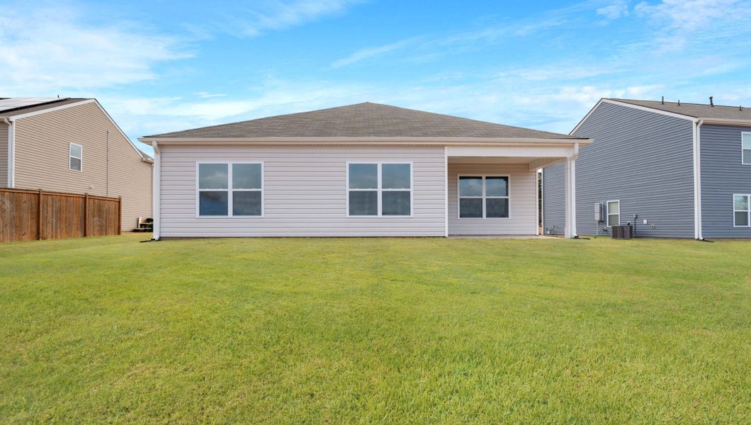 Exterior details and patio area of a home in Lightwood Cottages, Moore (Image 15).