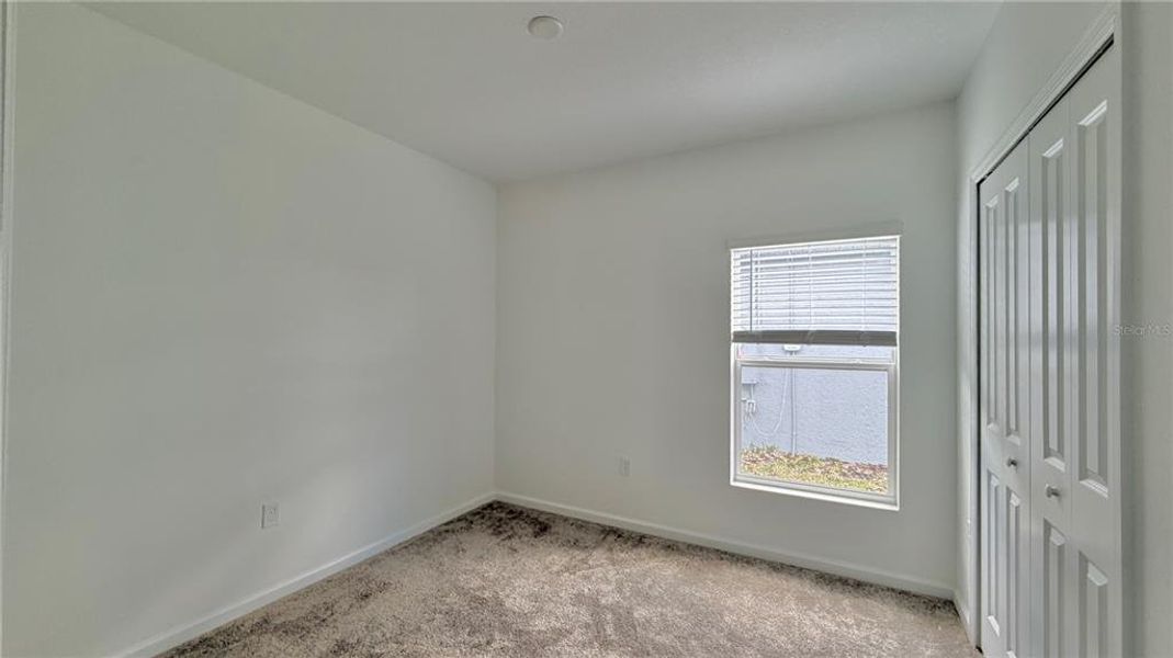 Spacious, unfurnished interior of a new home in Westview, Kissimmee (Image 21).