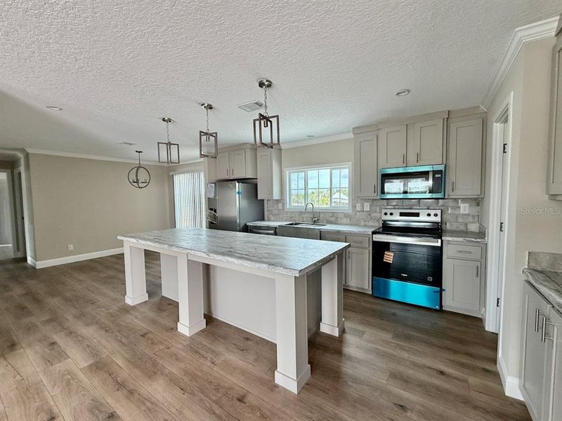 Furnished interior view inside a new home in , Okeechobee (Image 5).
