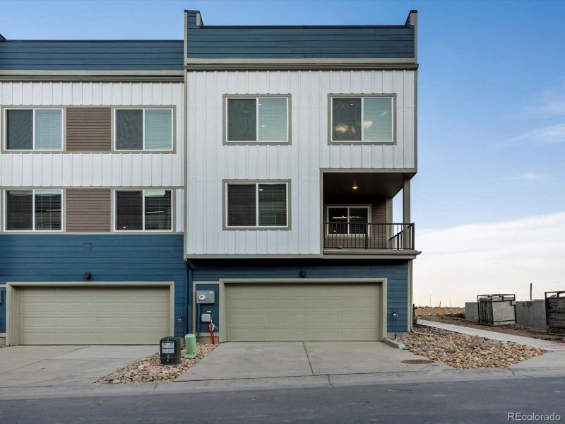 Front exterior of a new home in Three Hills, Morrison, CO, highlighting curb appeal (Image 19).