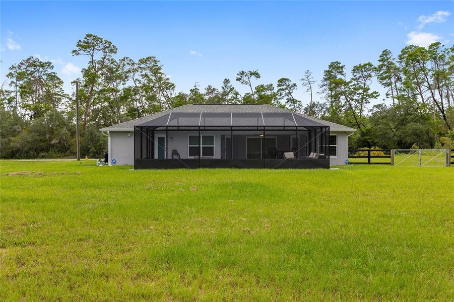 Front exterior of a new home in , Dunnellon, FL, highlighting curb appeal (Image 1).