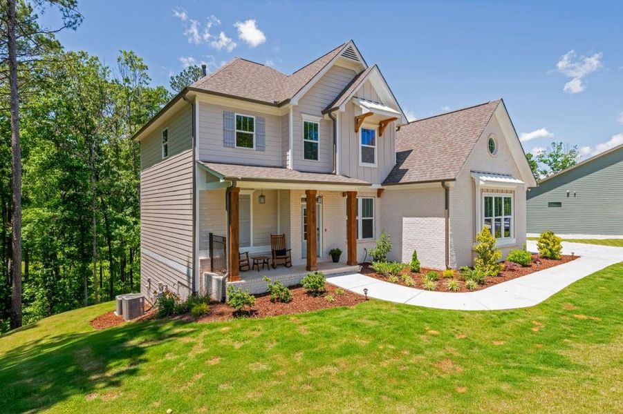 Front exterior of a new home in Liberty Springs, Woodstock, GA, highlighting curb appeal (Image 18).