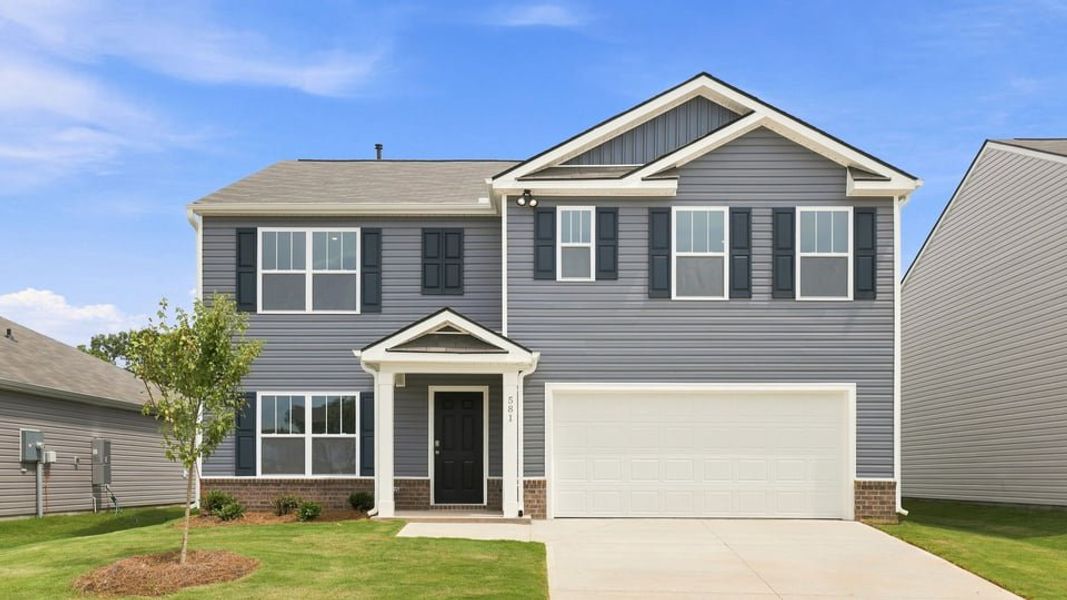 Front exterior of a new home in Lakestone, Woodruff, SC, highlighting curb appeal (Image 1). Front exterior of a new home in Lakestone, Woodruff, SC, highlighting curb appeal (Image 1).