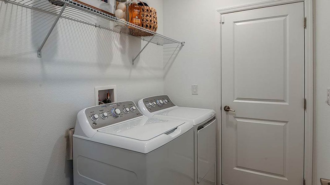 Representative furnished interior of a home built from the Magnolia by Taylor Morrison in Riverfront, Edgewater (Image 22).