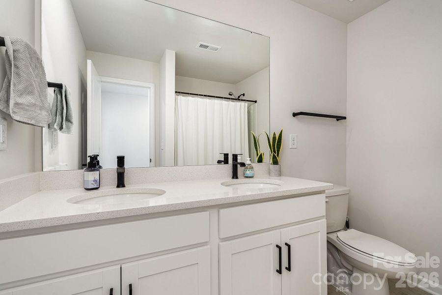 Furnished interior view inside a new home in Village at North Reach, Charlotte (Image 6).
