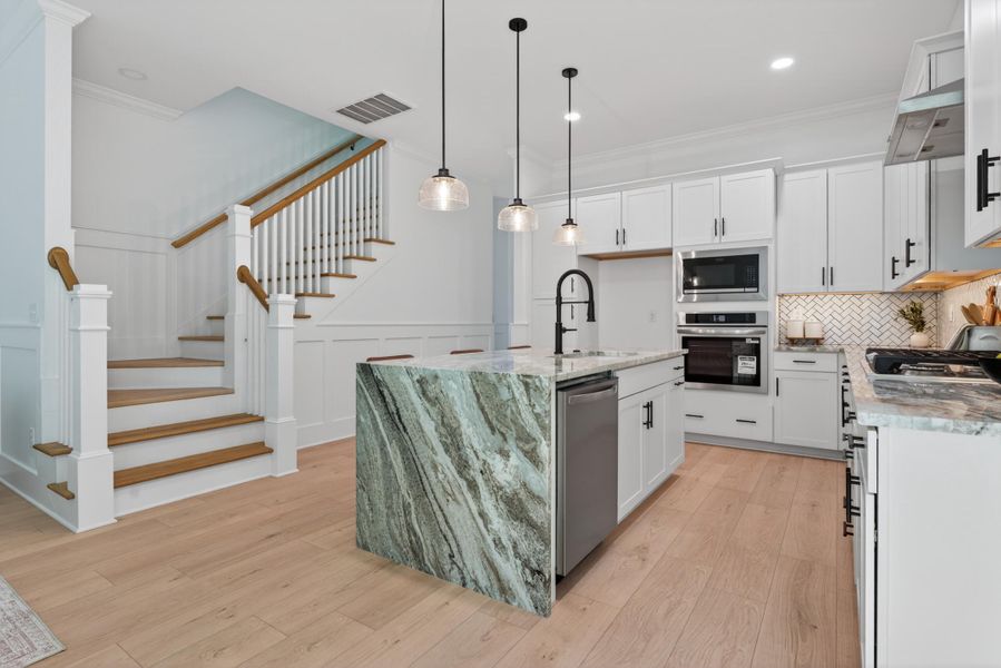 Furnished interior view inside a new home in , North Charleston (Image 8).